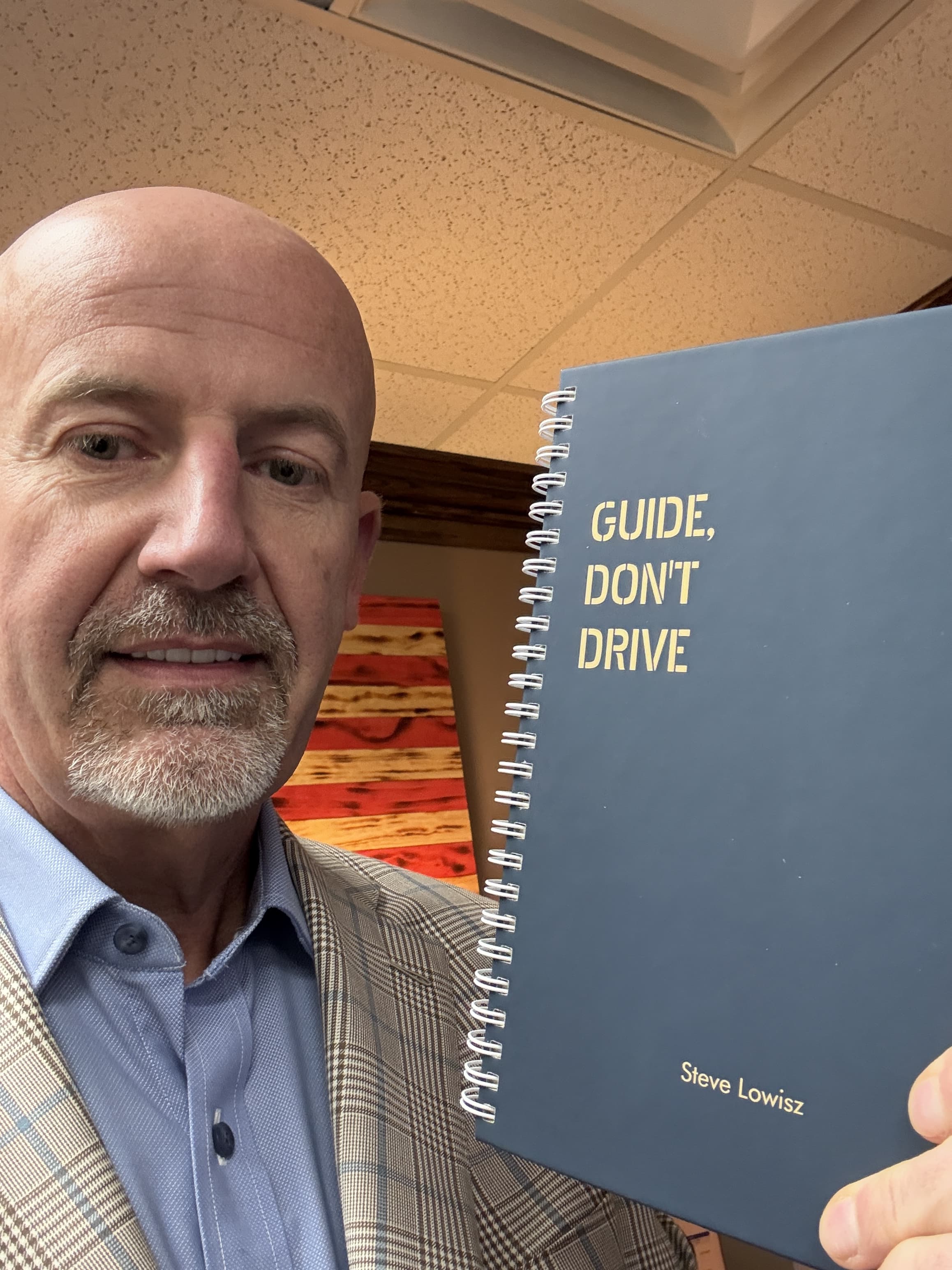 Steve Lowisz with Guide Don't Drive book