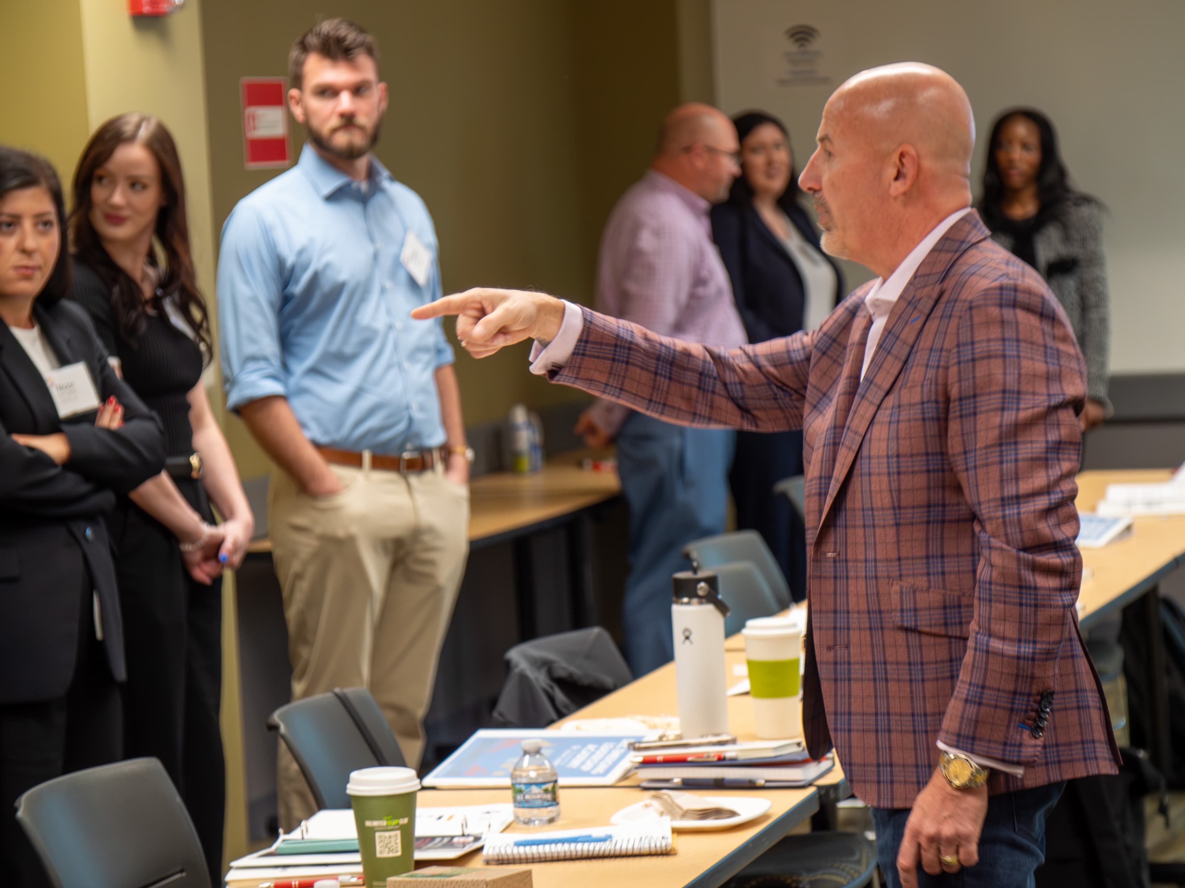 Steve Lowisz delivering a keynote on stage